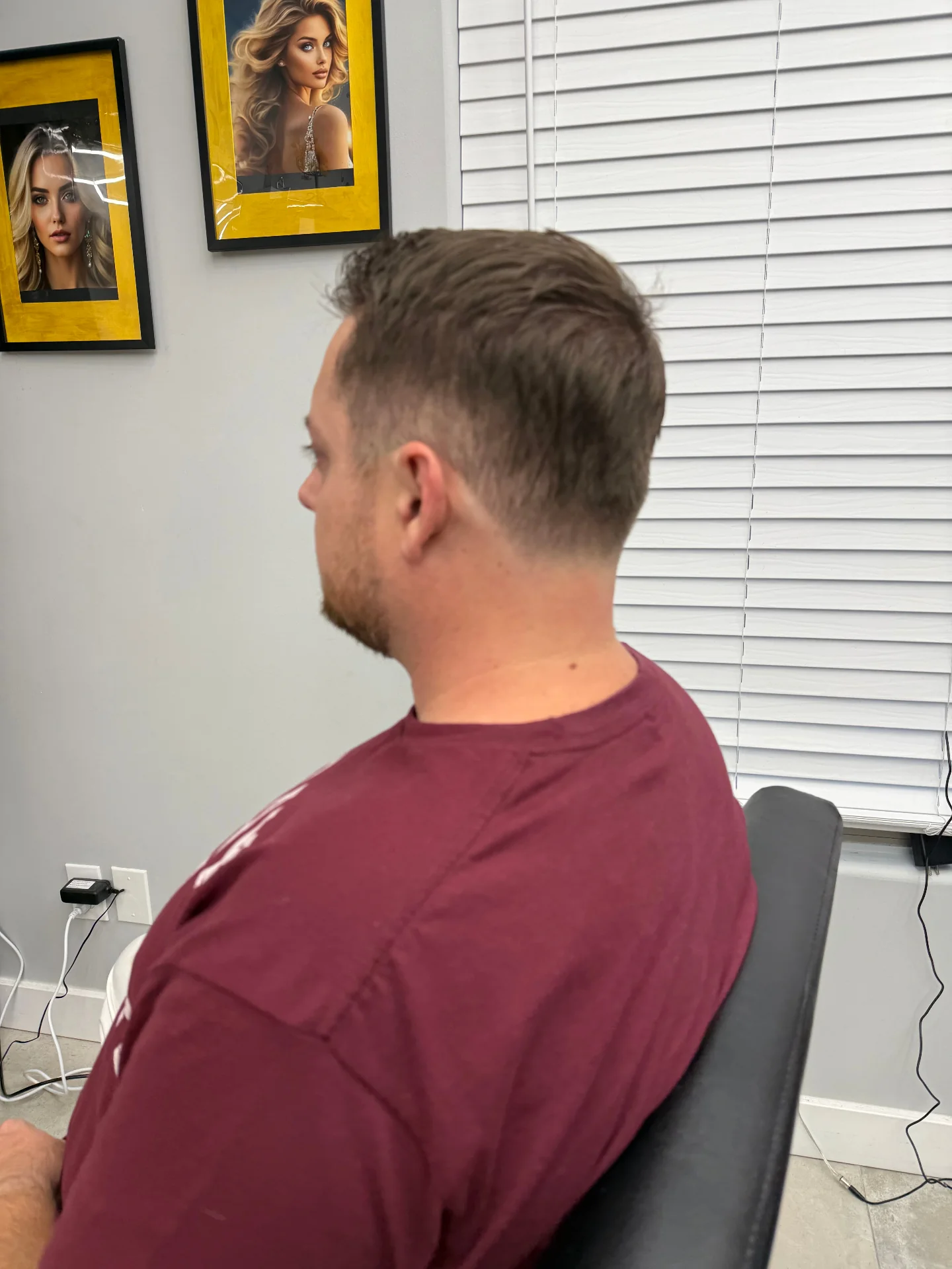 Client after tapered cut and clean neckline by Hair Ambition mobile barber in Goodyear, AZ