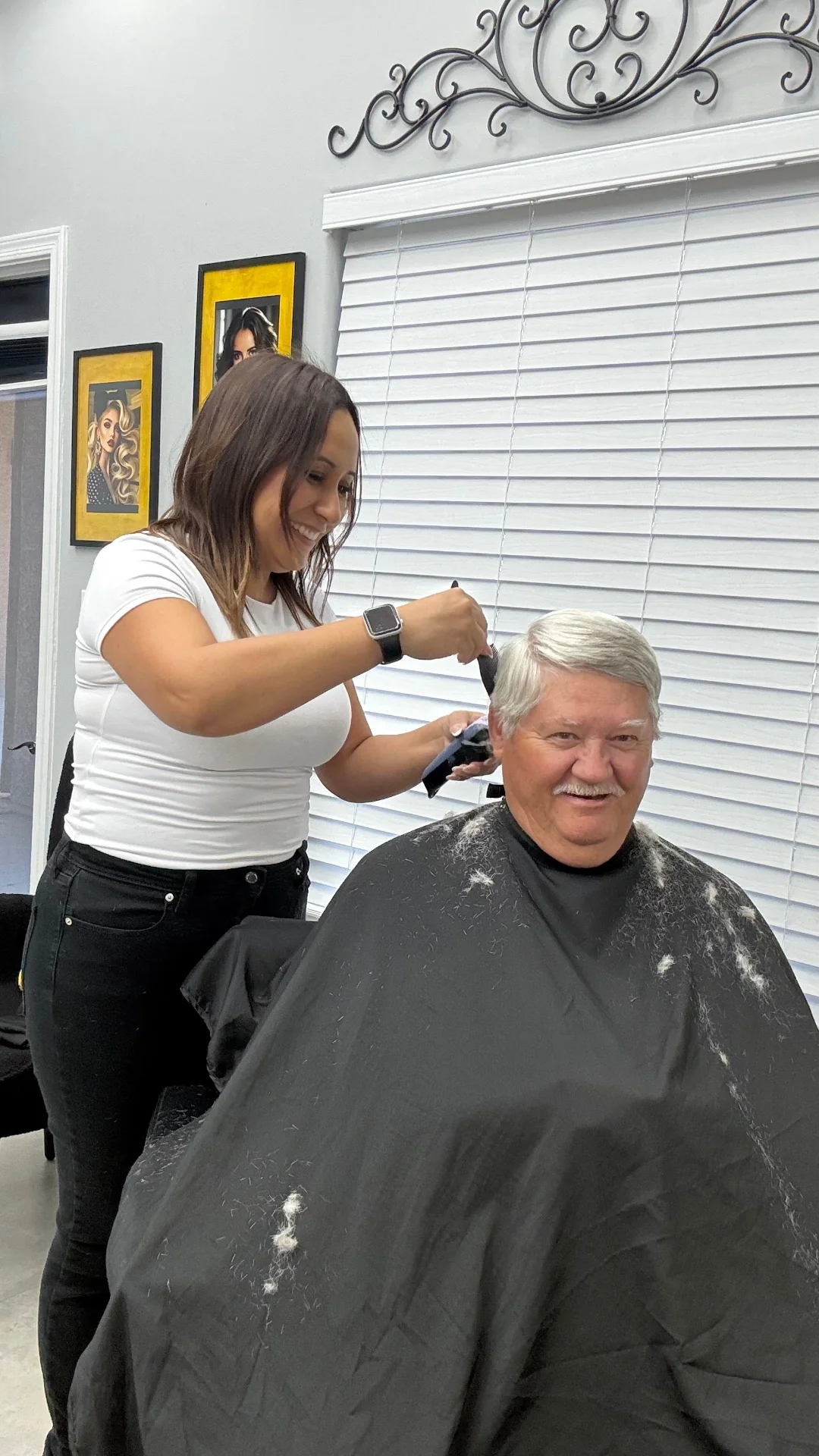 Senior men's haircut in progress with fresh trim lines and clipper work by Hair Ambition mobile barber in Goodyear, AZ
